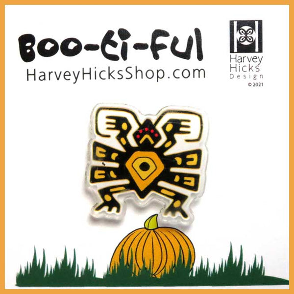 Halloween pin featuring an illustration of Quetzalcoatl the serpent god