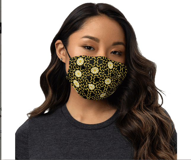 Face mask featuring a pattern of radiating hearts, ivory
