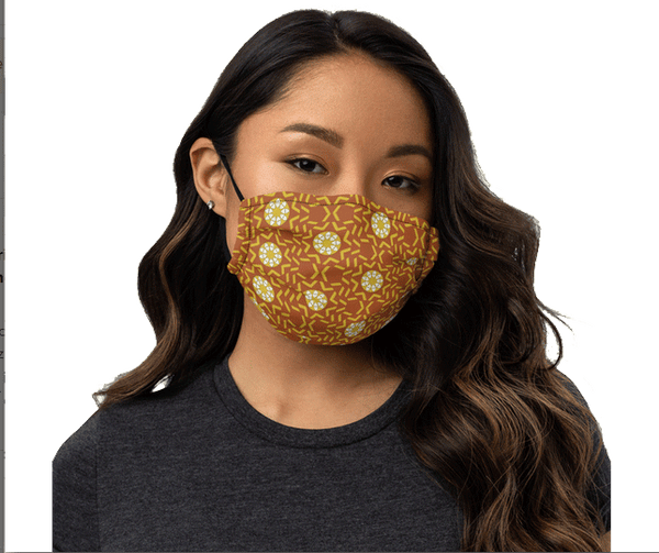 Face mask featuring a pattern of radiating hearts, wine