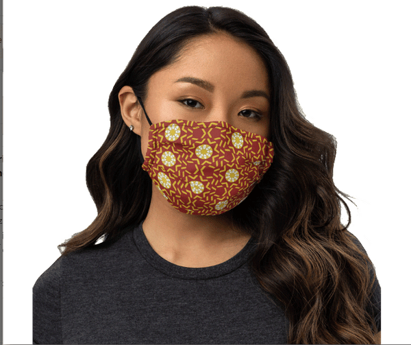 Face mask featuring a pattern of radiating hearts, ivory