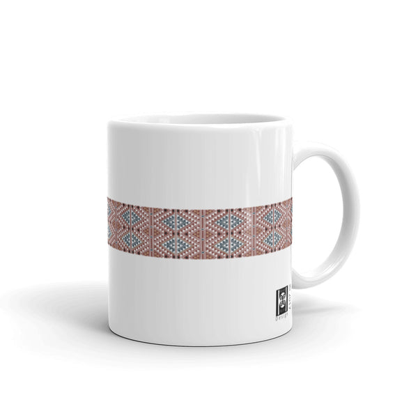 Mug, ceramic, featuring a textile motif from North Africa based upon a wood cut, white