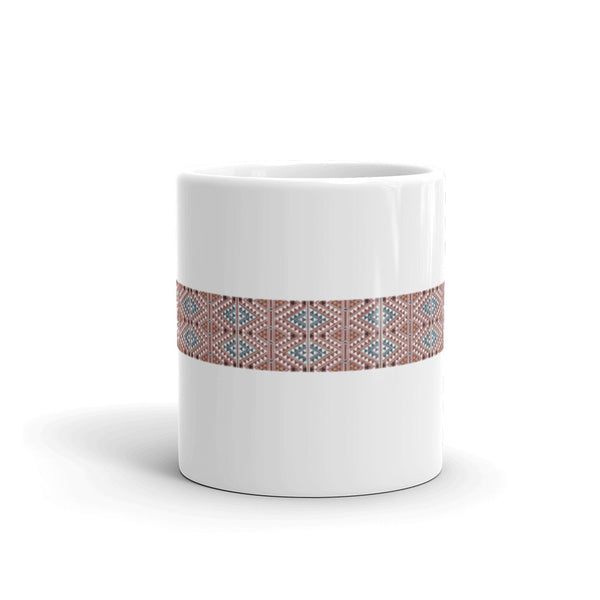 Mug, ceramic, featuring a textile motif from North Africa based upon a wood cut, white